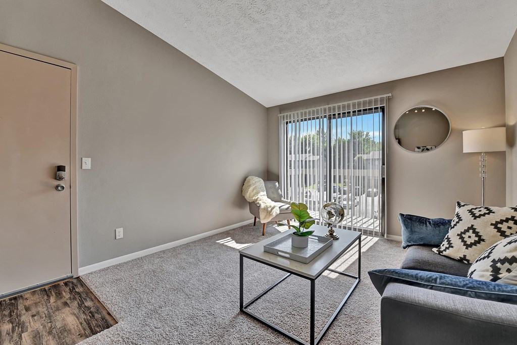 a living room with a couch and a table