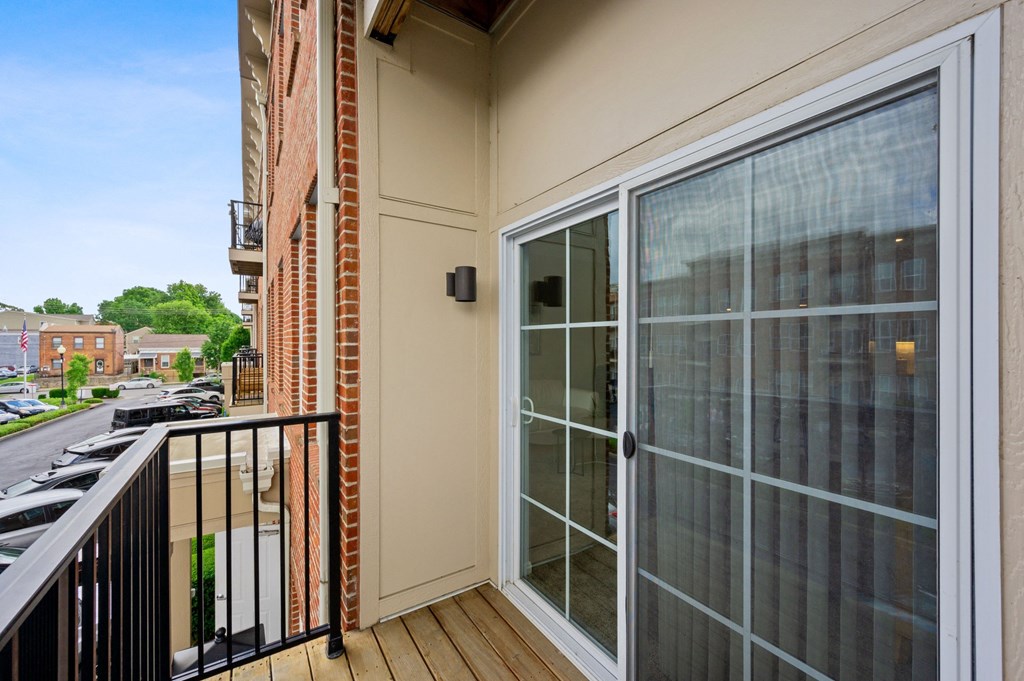 the view from the balcony of an apartment building with a glass door at Monmouth Row Apartments, Newport, 41071