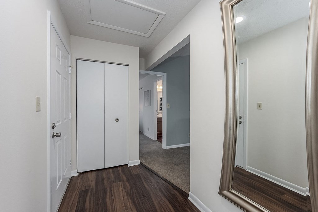 Bedroom with wooden floor at Normandy Club, Ohio