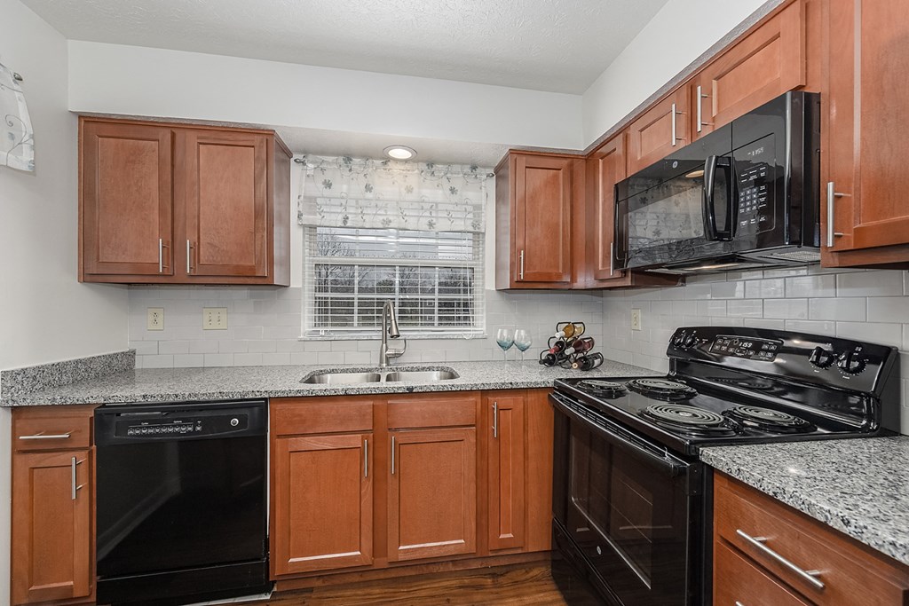 Kitchen with cabinets at Normandy Club, Centerville