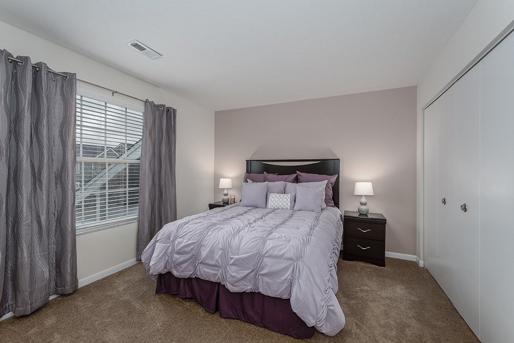 Bedroom with cozy bed at Normandy Club, Ohio