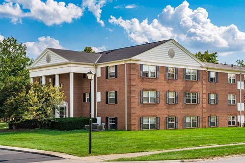 Three story brick building with white gabled roofline at Northtowne Apartments, Ohio, 43229
