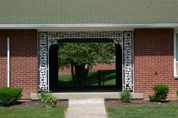 a large window on the side of a brick building