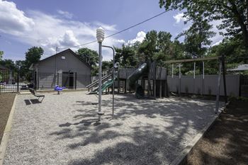 a playground with a slide and a swing set at Olde Towne in Kenwood, Cincinnati, 45243