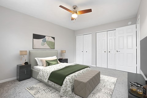a bedroom with a bed and a ceiling fan at Parkview of Lebanon Apartments, Lebanon, IN