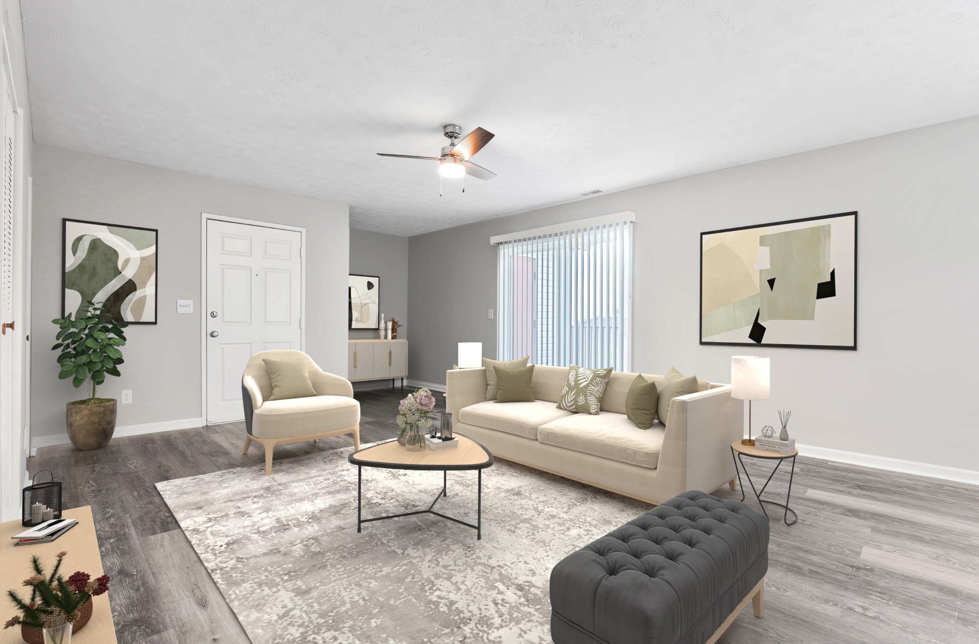 a living room with a couch and two chairs