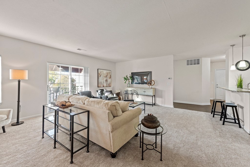 a living room with a couch and a table