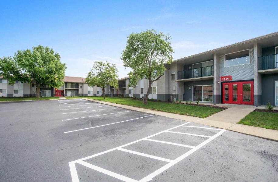 a parking lot in front of a building