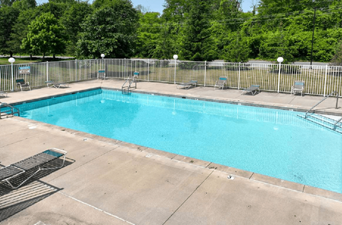 Large outdoor swimming pool with deck seating at Forest Ridge Apartments, Indianapolis, 46260