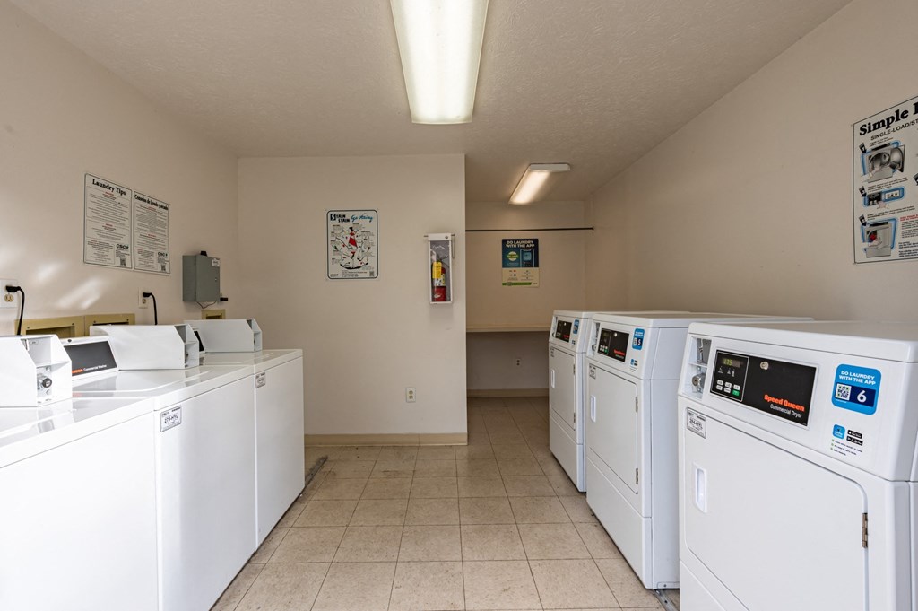 the laundry room is equipped with washes and dryers for your use  wh