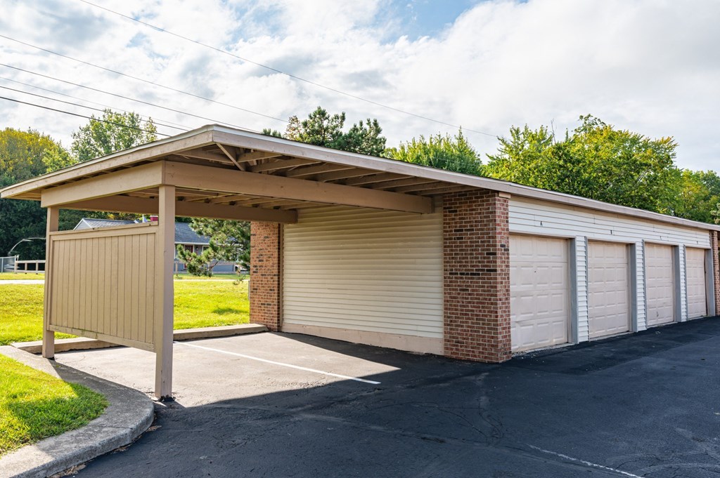 a small parking garage with a canopy over it