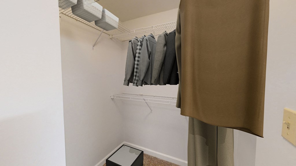 a walk in closet in a 555 waverly unit
