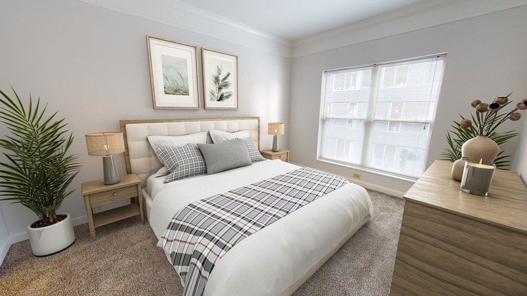 a bedroom with a bed and two windows