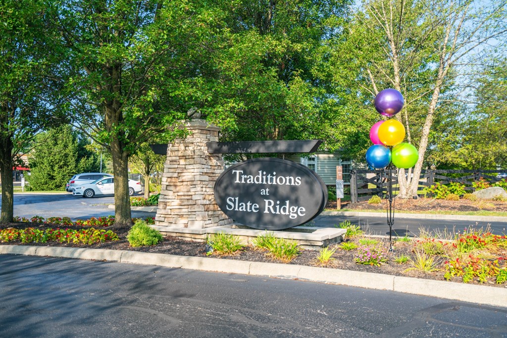 the sign for traditions at state at the entrance to the park