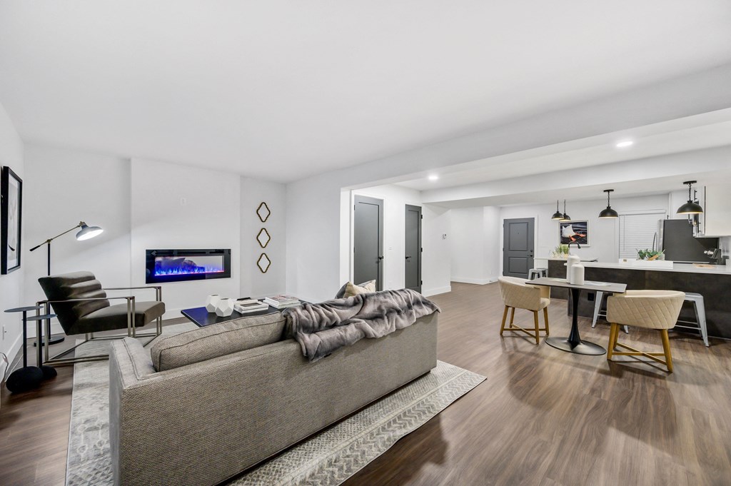 a living room and dining area in a 555 waverly unit