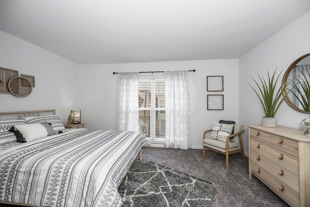 Bedroom with bed and cupboard at SoDel, Kettering, OH, 45429