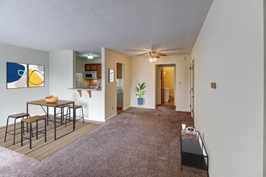 our apartments have a living room with a couch and a coffee table - Photo Gallery 2