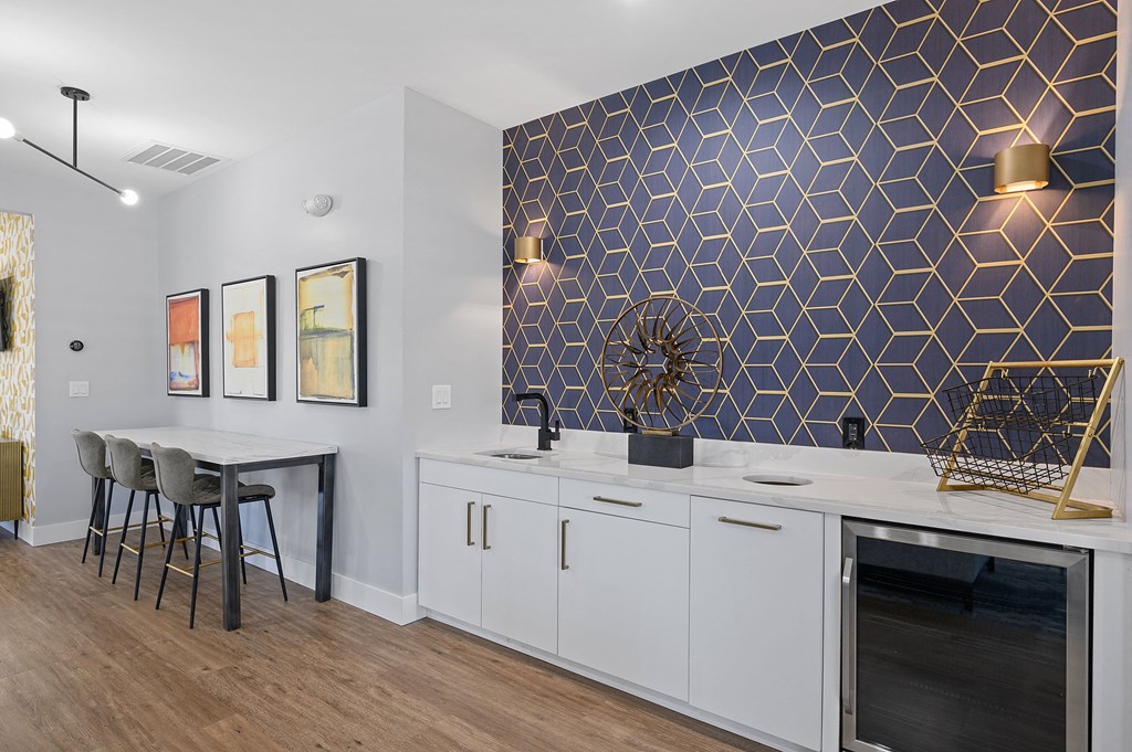 clubhouse picture featuring white cabinets