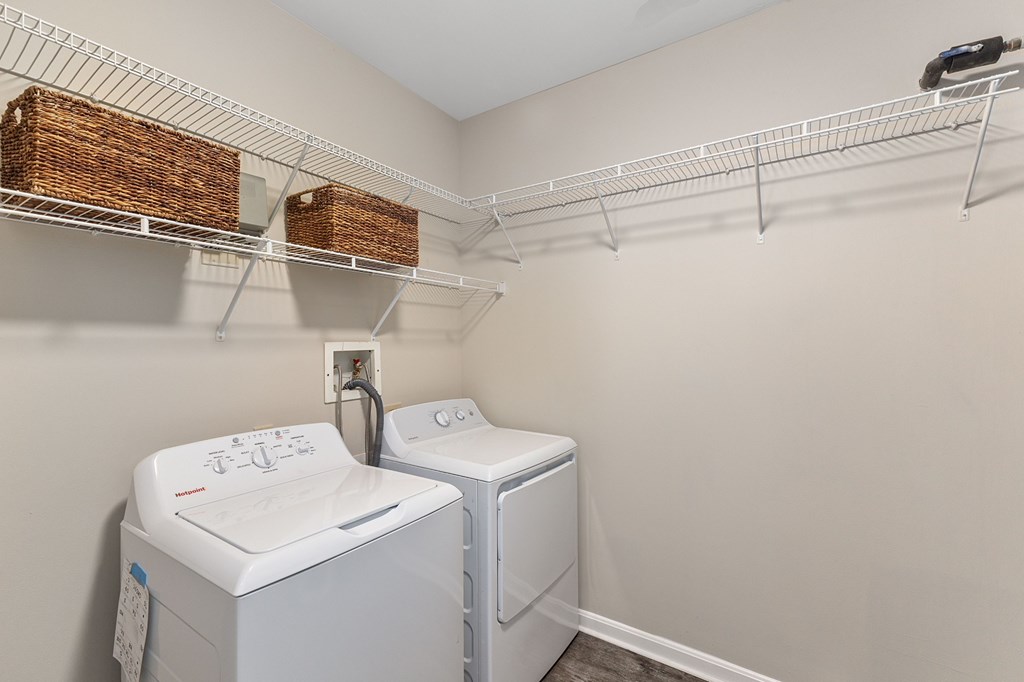 A laundry room with a washer and dryer.