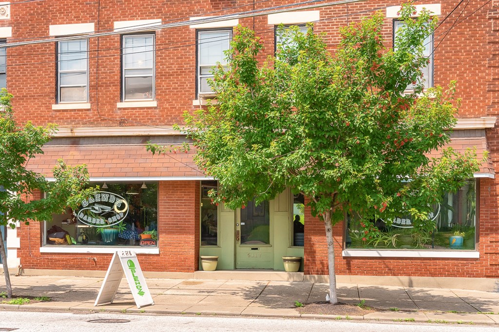 A tree in front of a building at The Ridge Apartments, Cincinnati, OH