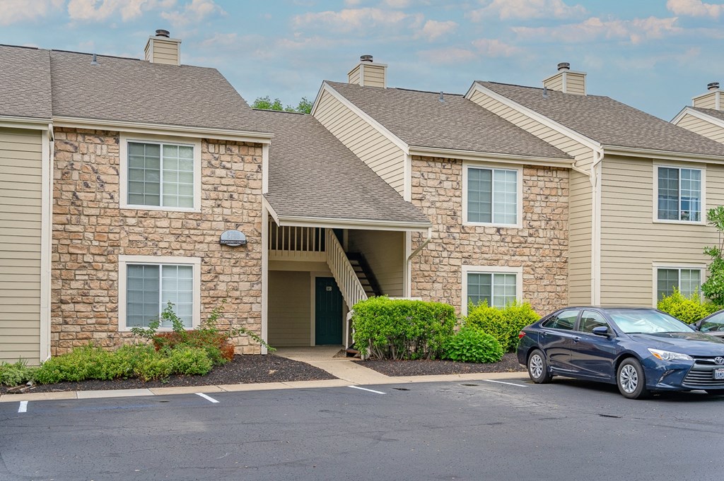 a car parked in a parking lot in front of a building at Enclave, Ohio, 45431