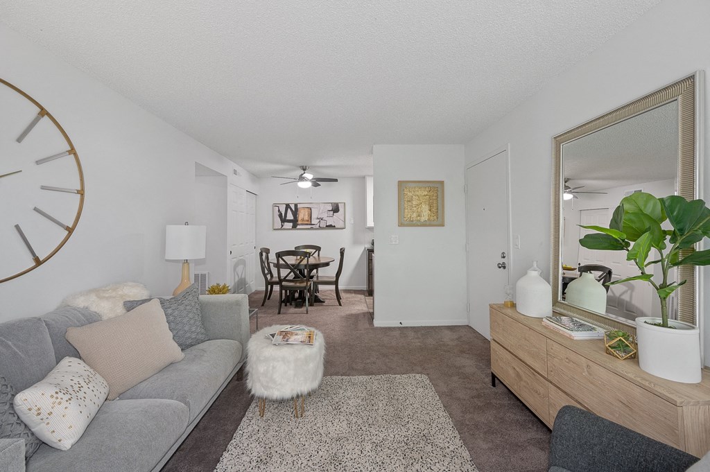 Living room with a large clock on the wall  at Timber Glen Apartments, Ohio, 45103