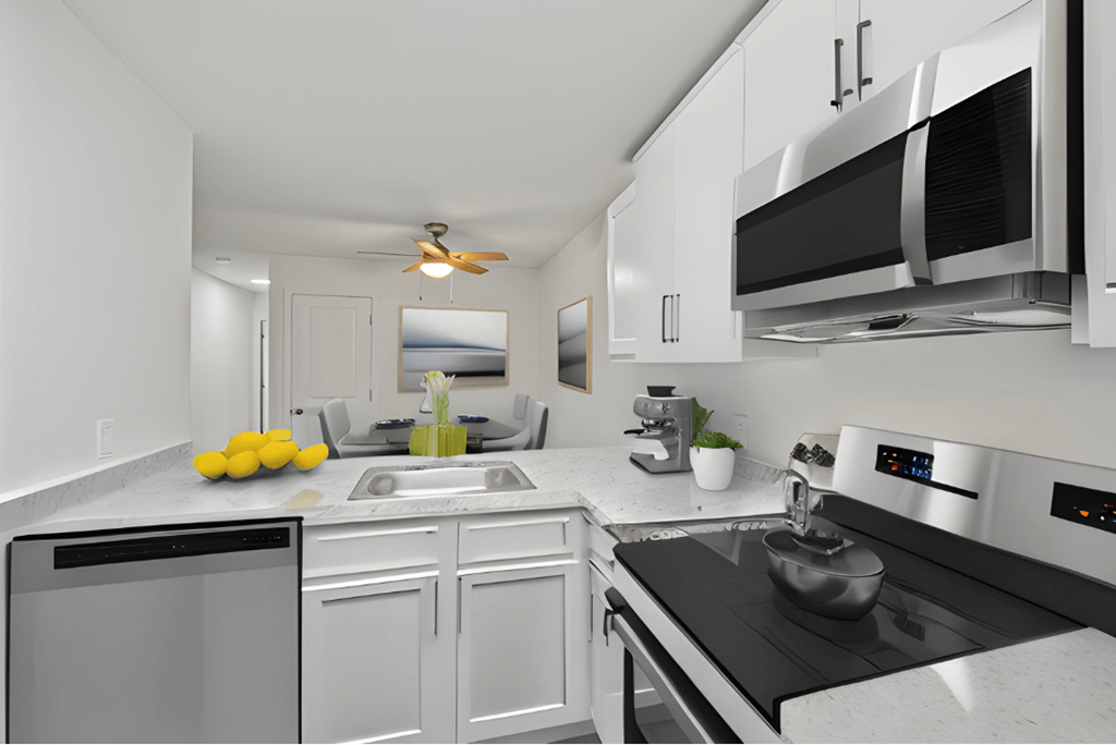 a kitchen with white cabinets and a counter top and a sink