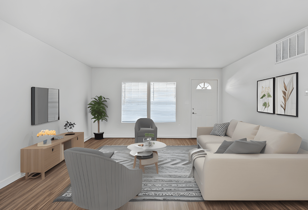 a living room with a couch and a chair and a table