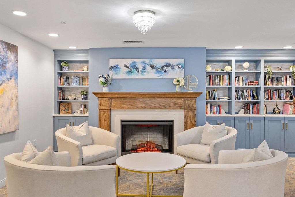 Living room with a fireplace and couches at The Valley, Ohio, 45242