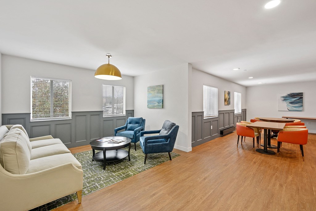 Living room with couches chairs and a table with a ping pong table in the at The Valley, Cincinnati, 45242