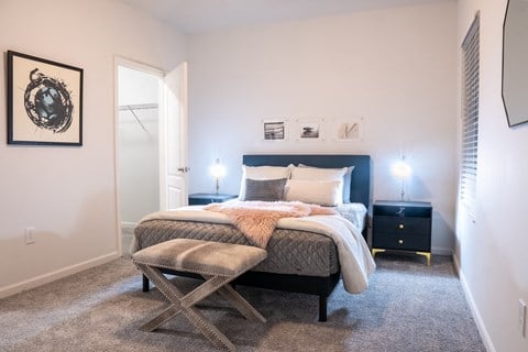 a bedroom with a bed and two night stands at Waterstone Landing, Perrysburg, 43551