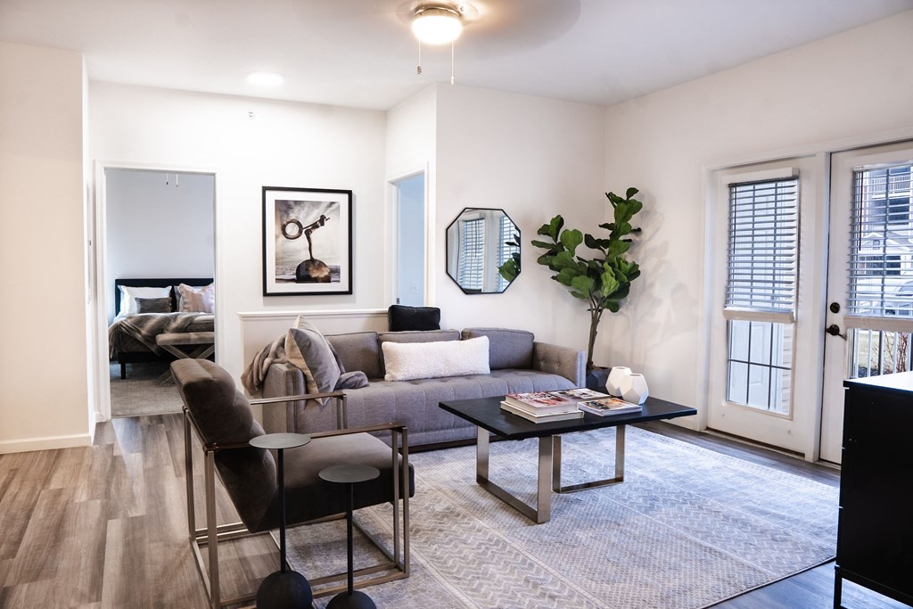 a living room with white walls and hardwood floors at Waterstone Landing, Ohio, 43551