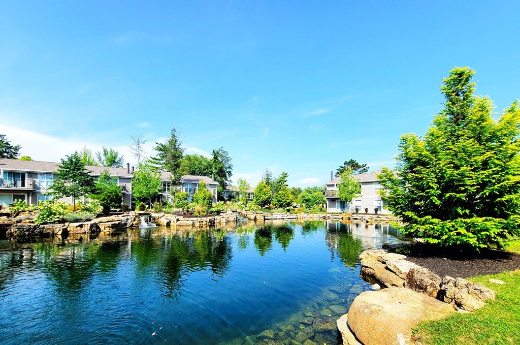 a pond in front of a building at Harpers Point Apartments, Cincinnati, 45249