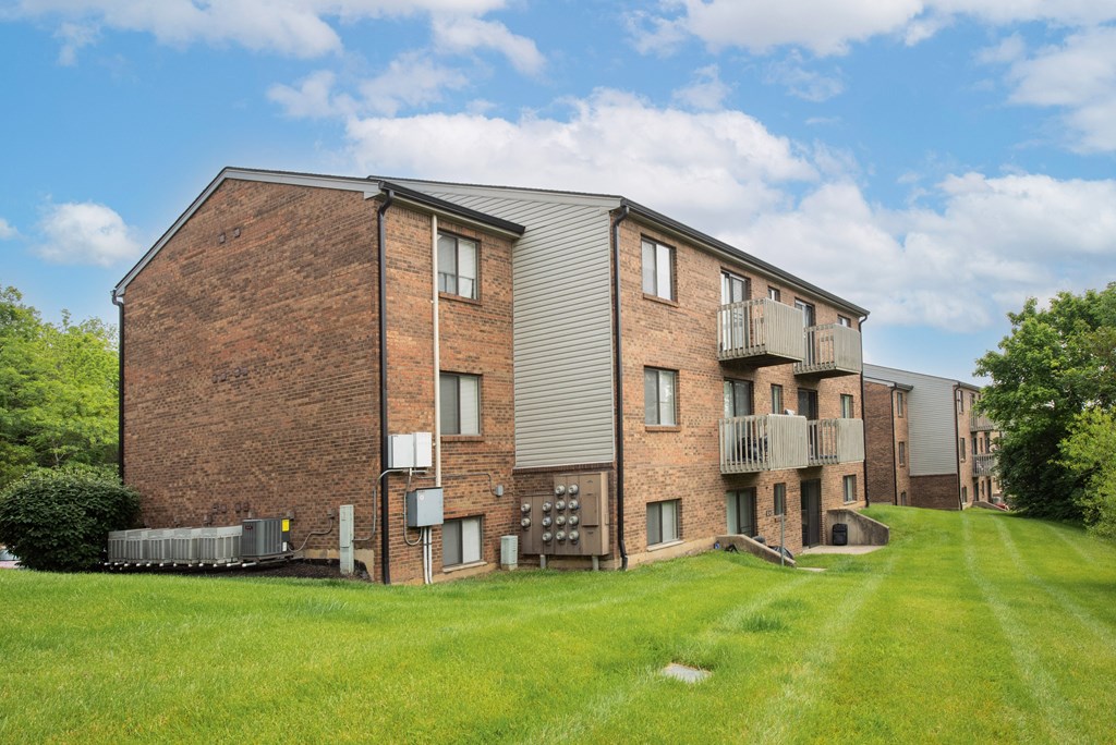 a fence in a field of green and purple stripes at The Woodridge Collection, Ohio, 45014