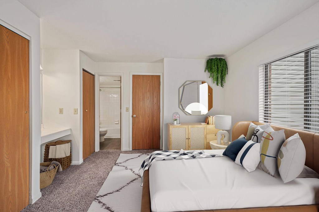 a bedroom with a large bed in a room at The Woodridge Collection, Fairfield, 45014