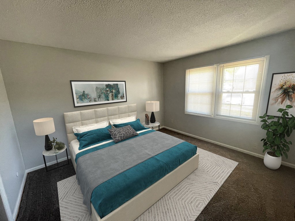 a bedroom with a bed and two windows