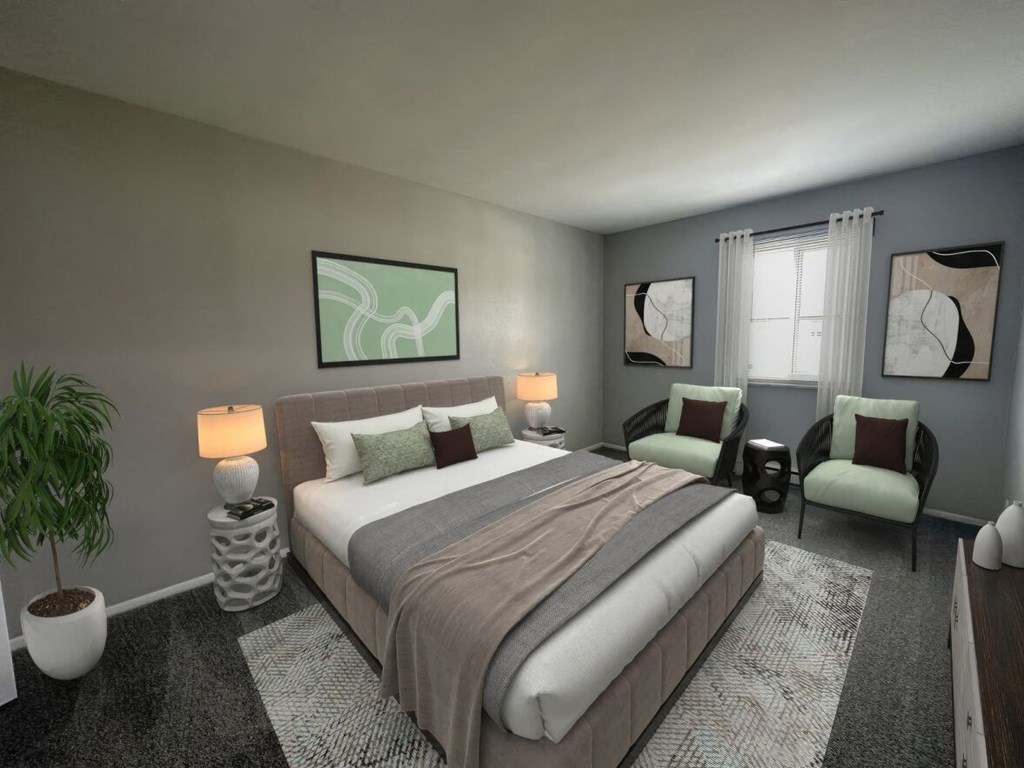 a bedroom with a bed and a chair in a room