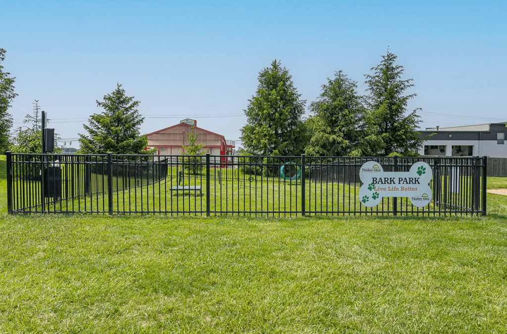 a park with a fence and a sign that reads park park  at Timber Glen Apartments, Batavia, Ohio