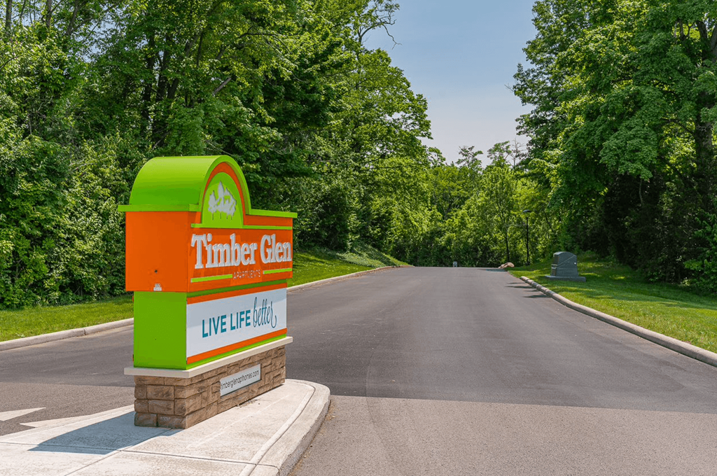 a sign for the thunder crab motel on the side of a road  at Timber Glen Apartments, Batavia, 45103