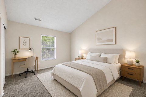 A bedroom with a large bed, a desk with a chair, and two lamps.