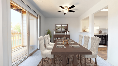 a dining room with a wooden table and chairs and a ceiling fan