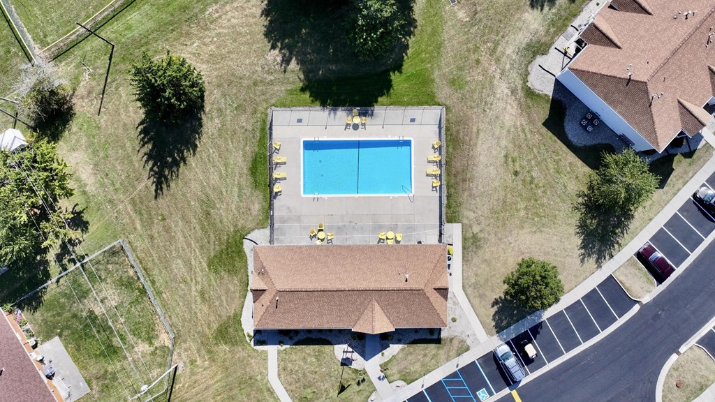 A house with a pool in the backyard.