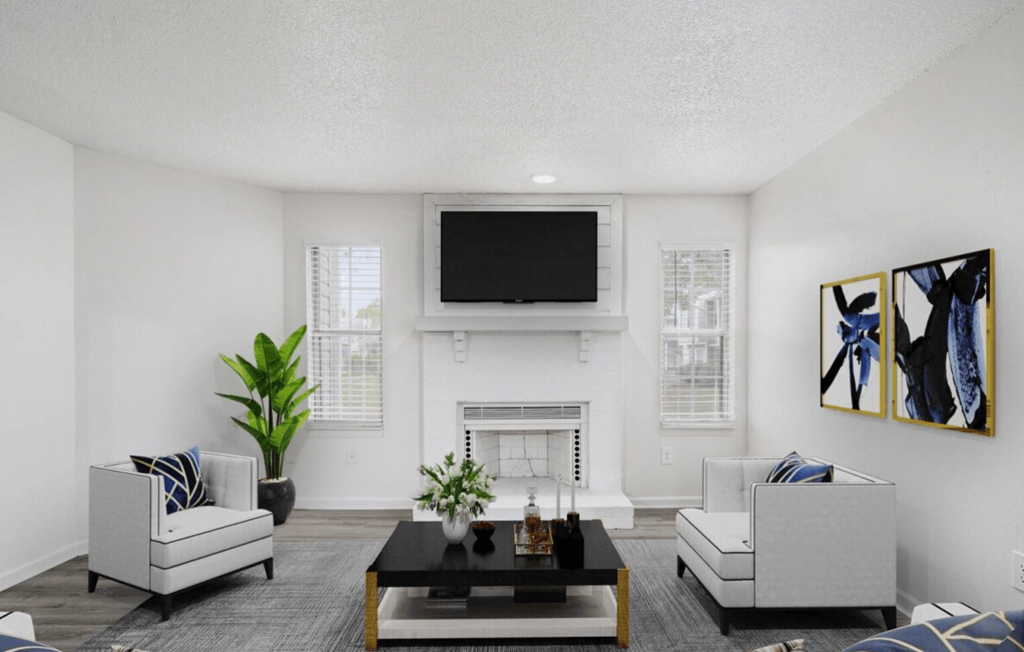 Living room with tv at The Berryessa Apartments, Columbus, 98104
