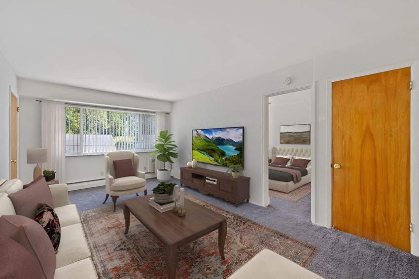 a living room with a couch and a table
