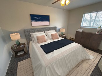 a bedroom with a bed and two night stands - Photo Gallery 14