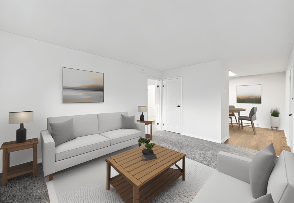 a living room with a white couch and a wooden table