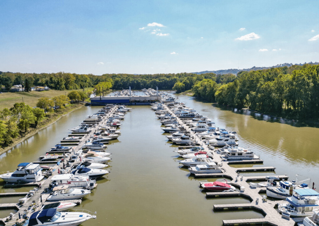 a marina filled with boats on a river