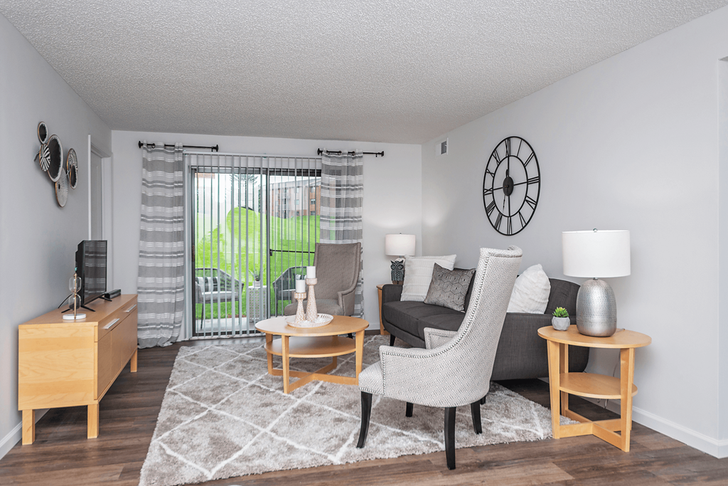 our apartments offer a living room with a couch and a table at Weaver Farm, Florence, KY