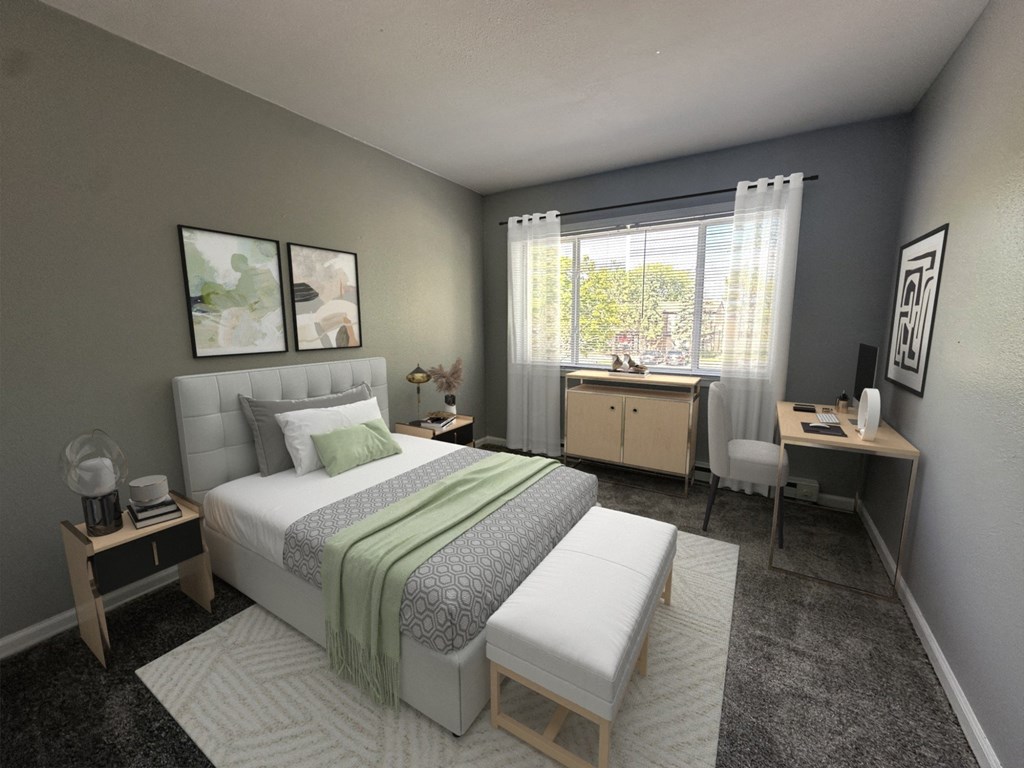 a bedroom with a bed and a desk and a window