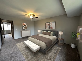 a bedroom with a bed and a ceiling fan - Photo Gallery 14